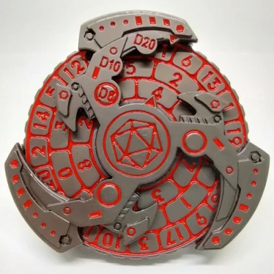 Dice spinner: Triskèle machinal - acier avec rouge dans une boîte