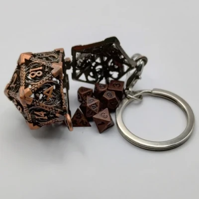 Porte-clef d20 - déchaînement de dragons - cuivre antique avec mini-kit de dés polyédriques 6mm