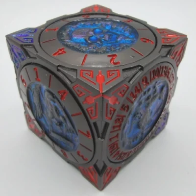 Cube de Chaos - noir avec rouge et bleu dans une boîte noire